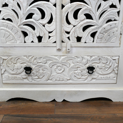 Tall ornate carved wood white shelved cupboard