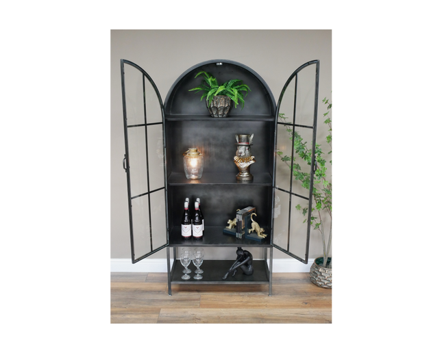 Arched tall slim glass fronted black metal storage display cabinet.