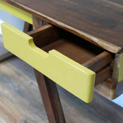 Stylish wood desk with yellow drawers