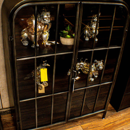 Glass fronted metal storage floor display cabinet.