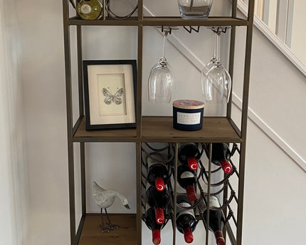 Tall slim metal multi compartment wine rack with shelving.