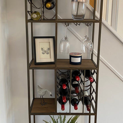 Tall slim metal multi compartment wine rack with shelving.