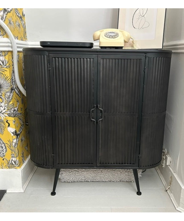 Curvy ribbed metal industrial retro storage cabinet