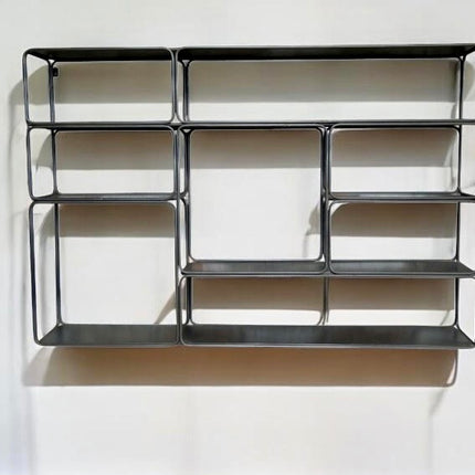 Industrial metal wall shelving display unit.