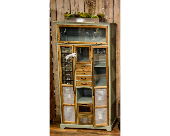 Tall green wood & metal multi drawer industrial storage cabinet.