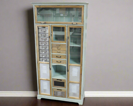 Tall green wood & metal multi drawer industrial storage cabinet.